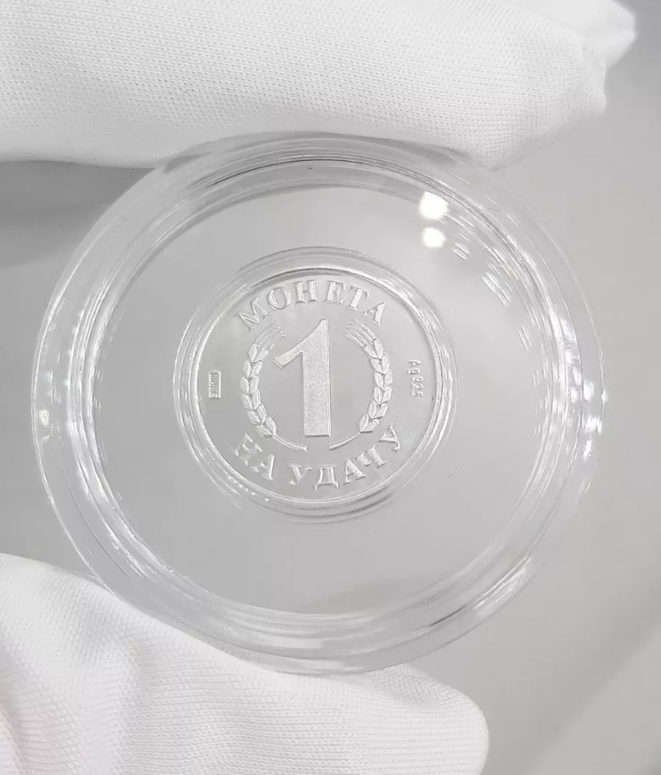 Серебряная монета с изображением Кролика. Символ года. (Арт. 9300409035)-2(1).png