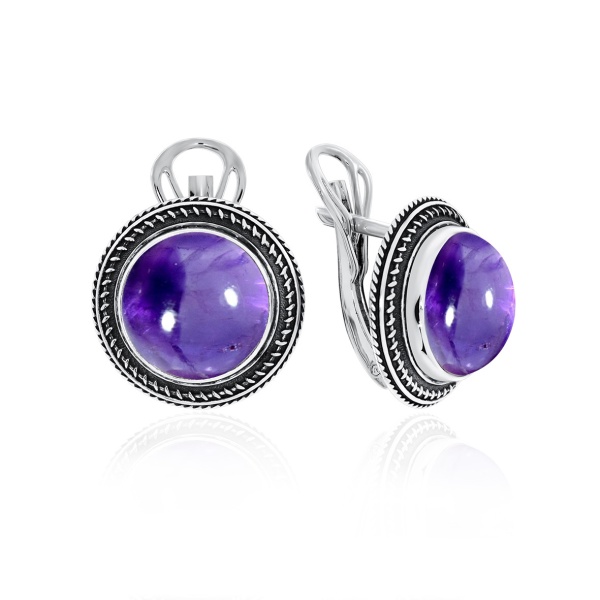 Серьги из серебра с корундом со скидкой